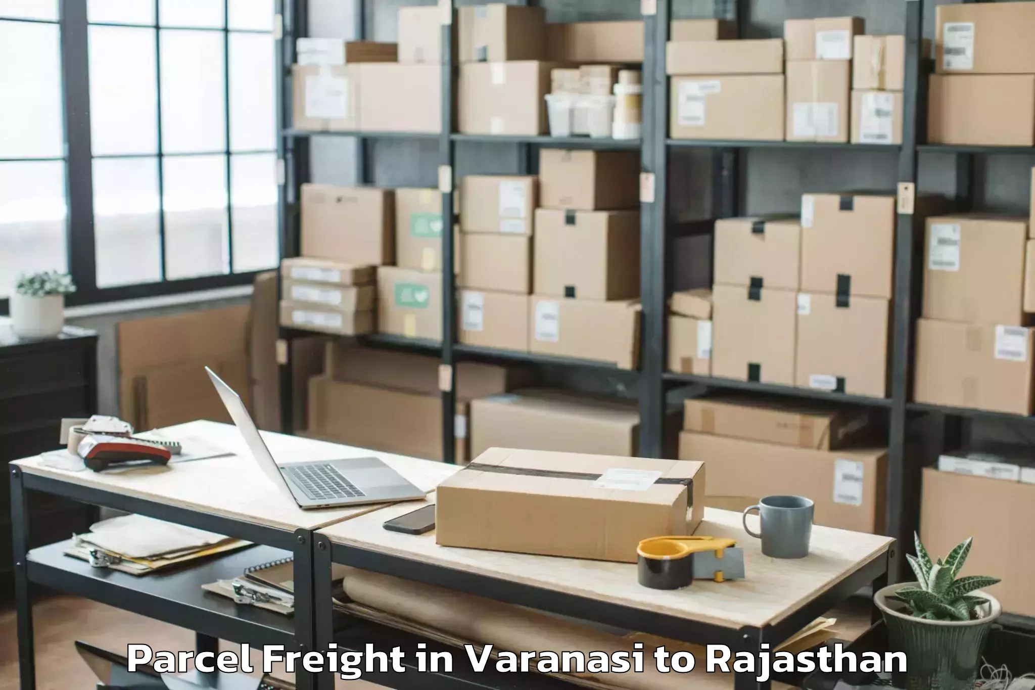 Book Varanasi to Jamwa Ramgarh Parcel Freight